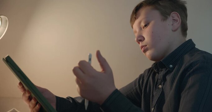 Kid Boy Draw with Stylus Pen on Tablet. 4K 10-bit