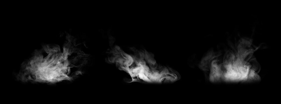 Realistic white smoke isolated on black background with swirling vapor, mist, fog effect, abstract texture, atmospheric overlay, and transparent design element for creative editing.