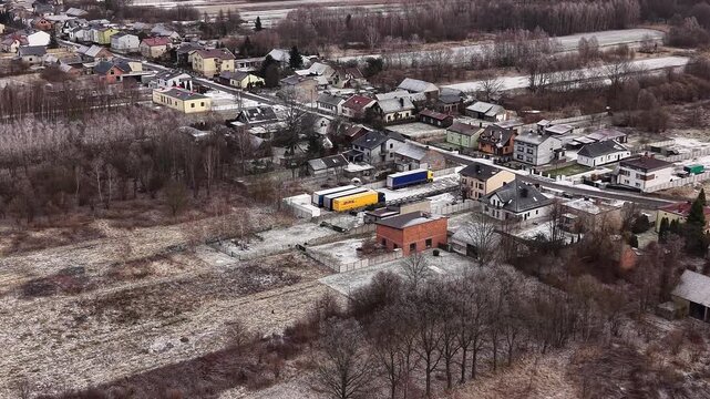 Courier transport trucks parked beside residential neighborhood 14.01.2026 Poland, Europe