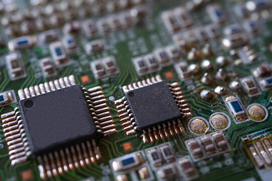 Macro shot of microchips on a printed circuit board