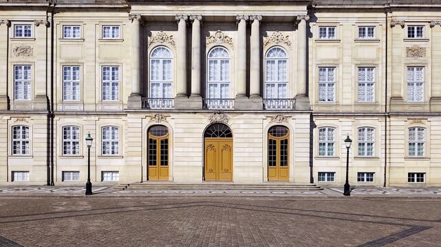 Exterior view of the symmetrical Rococo facade of Christian VII's Palace (Moltke's Palace) at Amalienborg in Copenhagen, Denmark. 