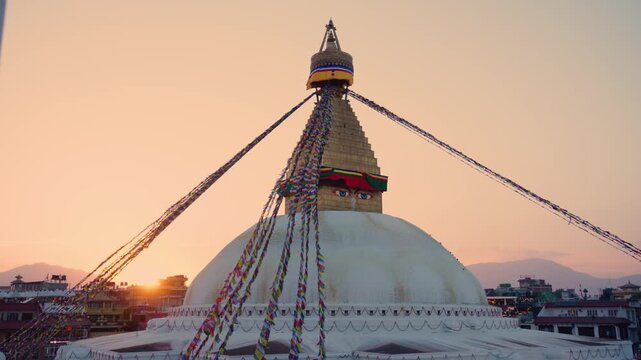 Boudhanath Stupa at Sunset with Colorful Prayer Flags in Kathmandu, Nepal