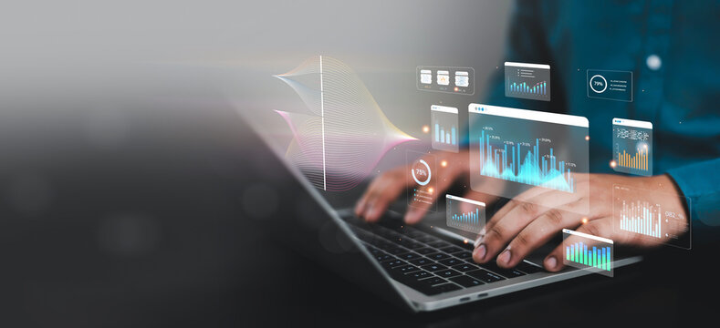 Business professional analyzing financial data dashboards on laptop with virtual analytics interface, AI technology, KPI metrics, big data visualization, digital transformation, business intelligence