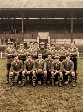 Vintage Rugby Team Group Portrait on Muddy Sports Field