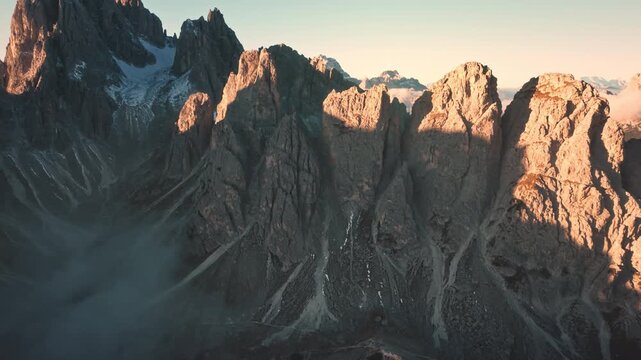 Aerial View of Cadini di Misurina Peaks Rising Above Foggy at Sunrise Dolomites Italy