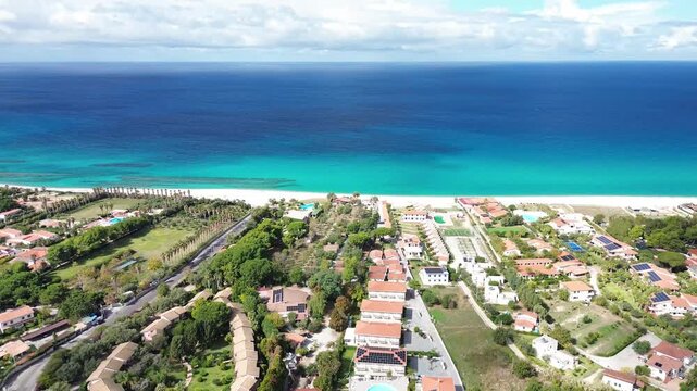 Costa degli Dei, Calabria, Italy. Aerial drone footage of the turquoise Tyrrhenian Sea, sandy coastline and seaside villages between Briatico and Tropea.