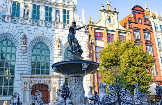 Neptune Fountain and colorful historic facades in Gdansk, Poland