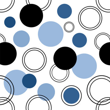Abstract geometric seamless pattern featuring varying sized solid and outlined circles with dots and bubbles in light blue. Dark blue. And black on a white background
