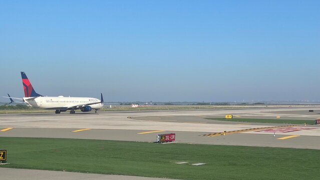 A plane on the runway at JFK, ready for takeoff on July 2, 2026 in Howard Beach, New York