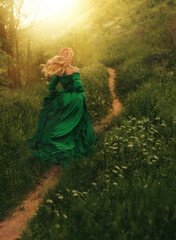 Art photo real person fantasy woman running on path summer nature forest grass green meadow person enjoy calm flowering field sky, Fairy sexy happy joy elf girl victorian dress old style back view © kharchenkoirina