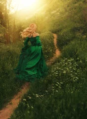 Art photo real person fantasy woman running on path summer nature forest grass green meadow person enjoy calm flowering field sky, Fairy sexy happy joy elf girl victorian dress old style back view © kharchenkoirina