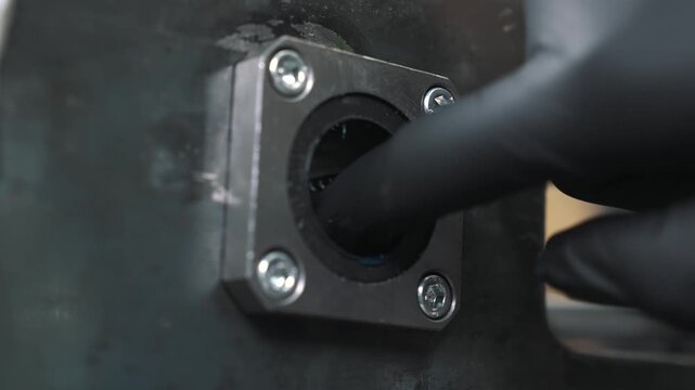The engineer greases the bore before assembling the bearing unit, and then installs the shaft in the work area