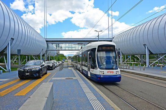 Geneva, Switzerland, Europe - 05.2026 : CERN, European Organization for Nuclear Research, passage above Route de Meyrin is Science Gateway - new Education and Outreach center, TPG tramway