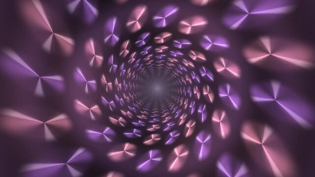 Swirling pattern of shapes in a tunnel with colored lights