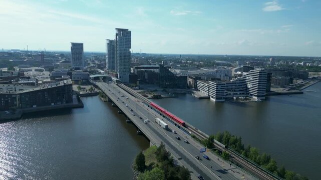 Aerial View of Kalasatama with Moving Metro Train and Bridge, Helsinki