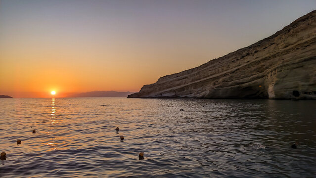 sunset on the beach in crete