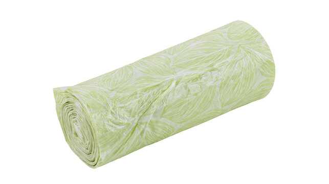 Roll of light green garbage bags with leaf pattern, isolated on transparent background