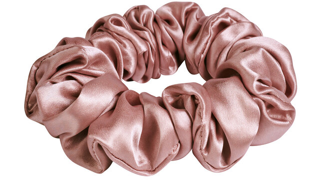 Rose gold satin scrunchie with gathered fabric texture, isolated on transparent background