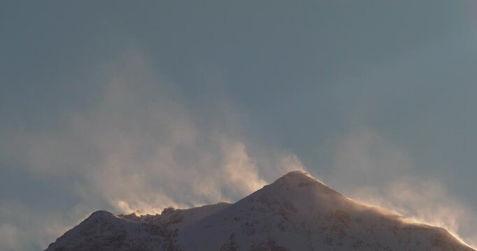 Snow-Capped Mountain Peaks at Golden Hour in the Alps