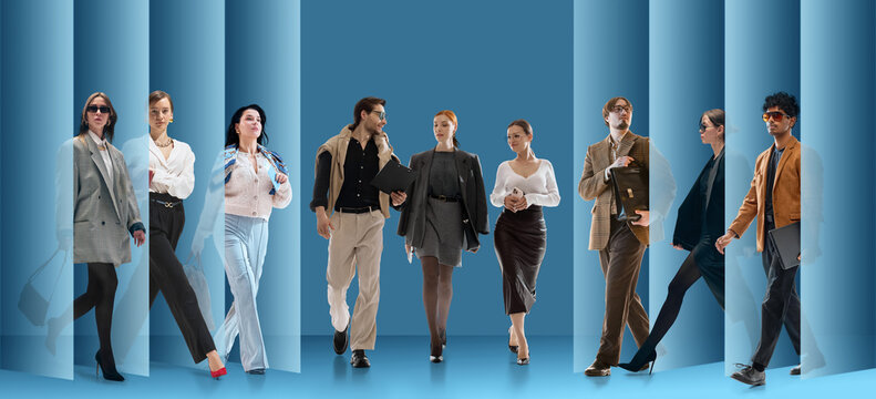 Modern professional team walks through blue panels for recruitment and corporate talent search. Concept of hiring, employer branding, diverse staff, and career campaign visuals.