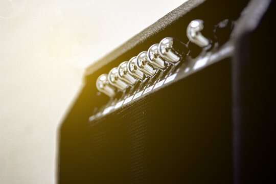 Volume and control knobs for a guitar amp.