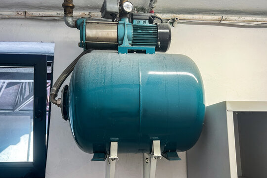 Close Up Of Indoor Pump And Tank