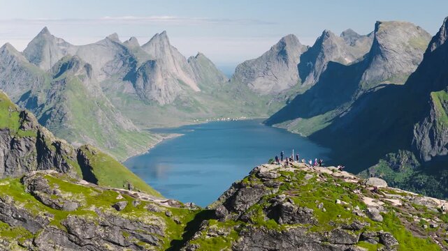 Spectacular 4K Drone Aerial of Reinebringen Overlooking Reine Village and Fjords, Lofoten Islands, Norway
