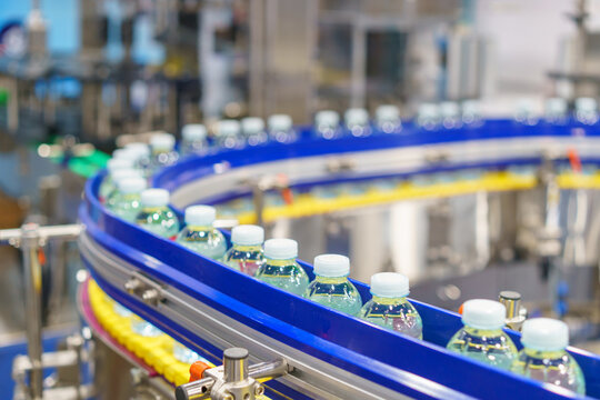 Bottled Drinking Water on Automated Production Line Conveyor