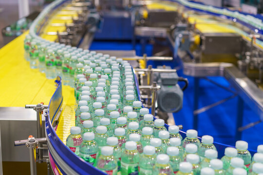 Bottled Drinking Water on Automated Production Line Conveyor
