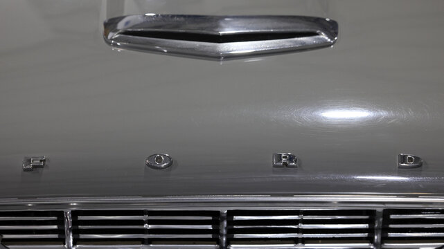 Perth, Western Australia, Australia - May 3 2026: Classic 1960 Ford Falcon XK sedan. Bonnet panel, individual chrome ford lettering. Hood scoop, front grille, vintage Australian automobile