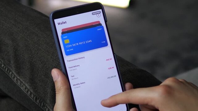 Mobile wallet app showing a credit card and a detailed transaction history. User taps a taxi expense and then a salary deposit to view receipts. Perfect for digital wallet UX, expense tracking