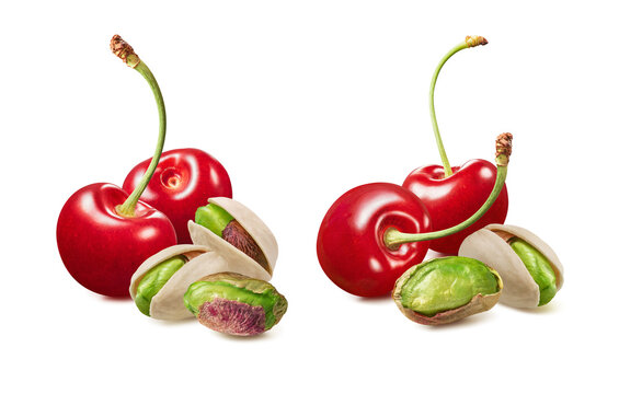 Sweet cherries and green pistachio nuts isolated on white background. Real photography