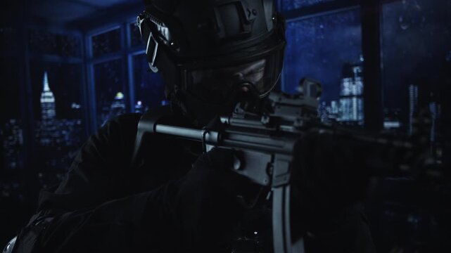 Cinematic footage of a tactical soldier in a helmet and goggles aiming an assault rifle in a dark building overlooking a city skyline at night.