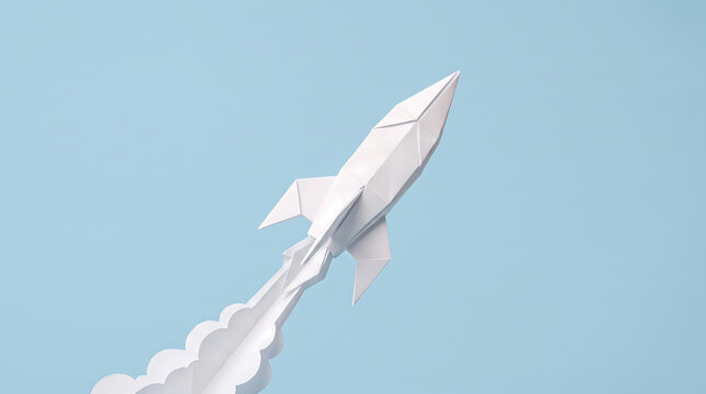 Clean white origami paper rocket ship taking off against a pastel blue background