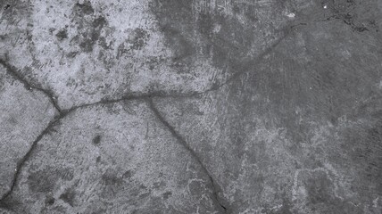 Black and white abstract concrete texture with dark vertical streaked area, peeling surface marks, and grunge distressed background. © Teguhprabowo