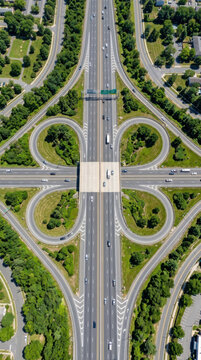 Aerial View Of Complex Highway Interchange In Busy Urban Area