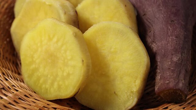 Sliced Sweet Potatoes in a Wicker Basket