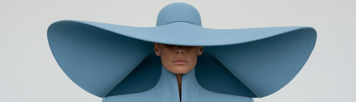 Woman Wearing Wide Brim Blue Hat in Bright Outdoor Light High Angle Shot