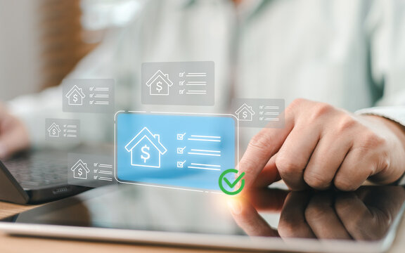 Investor touching tablet screen with virtual real estate house loan checklist icon for property investment profit, mortgage valuation approval, banking finance and home choice search concept