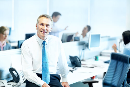 Portrait, hapy and professional with business man in office for insurance agent, about us and policy review. Risk analysis advisor, happy and underwriter with mature employee in agency for claims