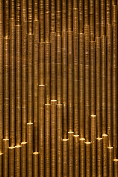 A pile of coins is stacked up, cash coins, wealth background, millions and billions concept