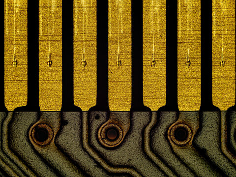 Macro view of laptop RAM memory gold connector contacts