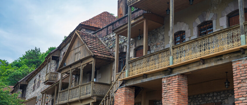 Old Dilijan street with traditional carved wooden balconies with copy space