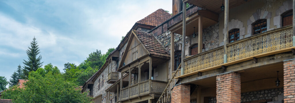 Old Dilijan street with traditional carved wooden balconies with copy space