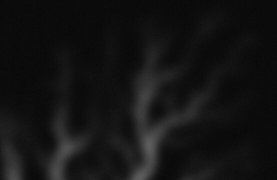 Mysterious silhouette against dark gradient background
