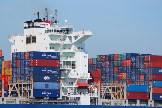 SAN FRANCISCO, USA - APRIL 8, 2014: CMA CGM Centaurius container ship sails in San Francisco bay. CMA CGM is the one of largest container shipping companies in the world.