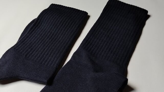 Socks isolated on a white background. Suitable for fashion, textile, footwear, retail, online shopping, product catalogs, branding, advertising, and apparel-related marketing materials.