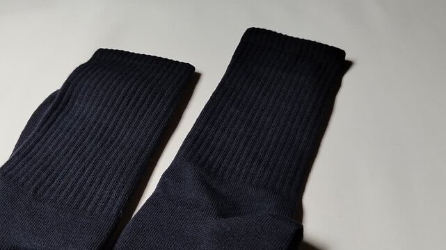 Socks isolated on a white background. Suitable for fashion, textile, footwear, retail, online shopping, product catalogs, branding, advertising, and apparel-related marketing materials.