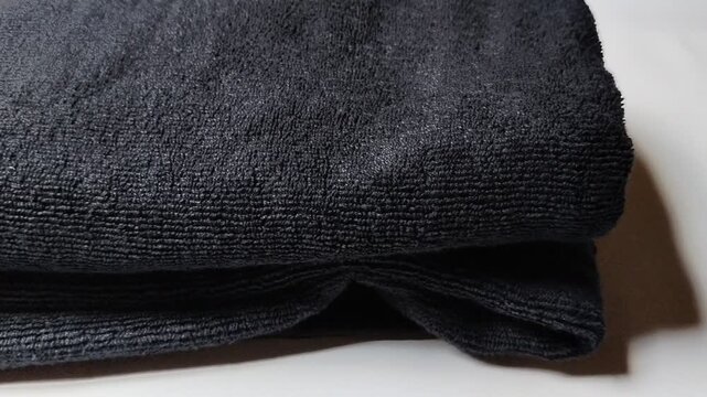 Fresh unused towel fabric with a soft absorbent surface, showcasing high-quality textile material for bathroom, hotel, spa, wellness, laundry, cleaning, and home lifestyle concepts. Ideal for commerci