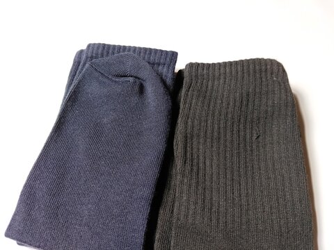 Socks isolated on a white background. Suitable for fashion, textile, footwear, retail, online shopping, product catalogs, branding, advertising, and apparel-related marketing materials.